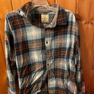 A Plaid button down presented by Woven Goods